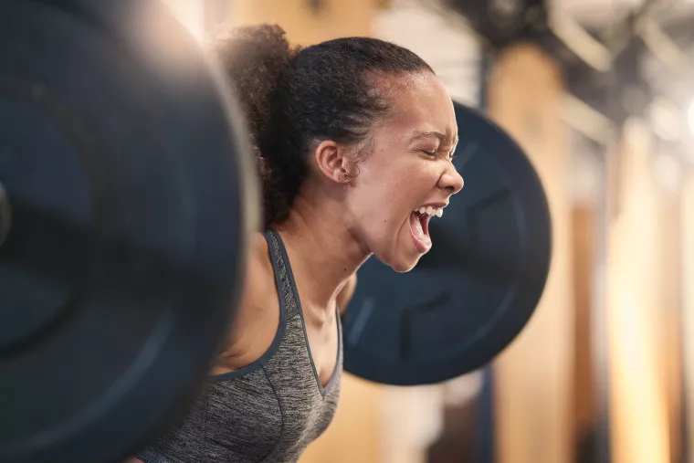 Photo: Woman lifting weights