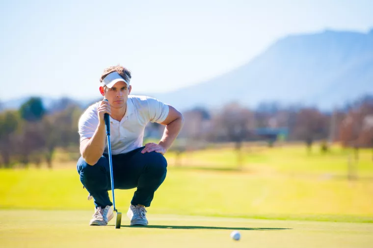 Photo: Golf player planning play