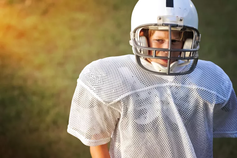 Athlete in football gear