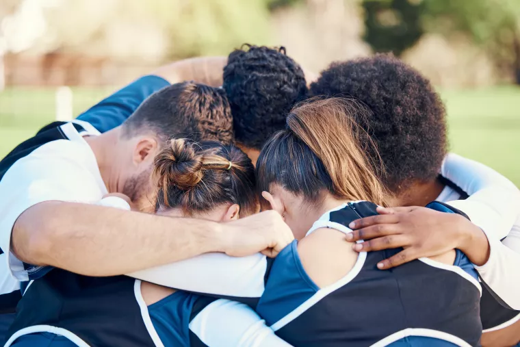 Photo: Team huddle